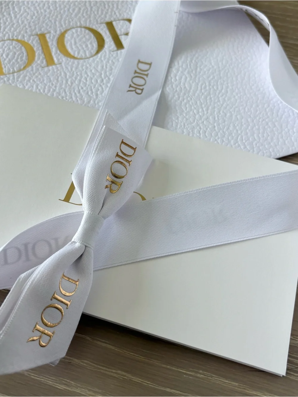Dior gift box and bag with logo ribbon
